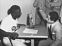 Jackie Robinson interviews Faisal II during his visit to the United States, 1952