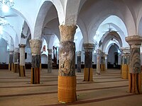 The An-Naga mosque is a 1610 reconstruction of a 10th-century mosque, it has original richly decorated Roman capitals crowning the forest of columns in its multi-domed hall.[61]