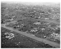 Aerial view showing wreckage and debris from destroyed homes