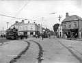 The route 16 tram (left) & the route 15 tram (centre) at Terenure Cross, c. 1900. The line in the foreground connected with the D&BST's Terenure depot. It was used at night to transfer goods between the two systems.
