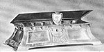 Black and white photograph of a copper casket