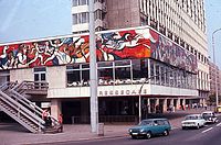 Murals displaying the Marxist view of the press on this East Berlin cafe in 1977 were covered over by commercial advertising after Germany was reunited.