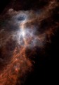 Infrarotaufnahme des etwa 100 Lichtjahre ausgedehnten „Integral-shaped Filament“ mithilfe des Herschel-Weltraumteleskops, die die Molekülwolke orange zeigt.