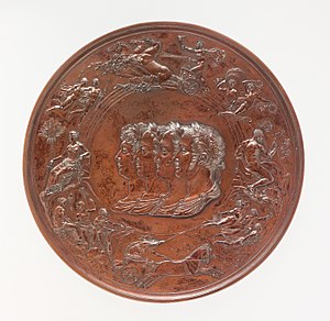 A bronze medal of considerable complexity, with a series of allegorical figures surrounding the central busts of four men, the victorious generals at Waterloo