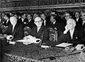 Image 27Konrad Adenauer, Walter Hallstein and Antonio Segni, signing the European customs union and Euratom in Rome in 1957 (from History of the European Union)