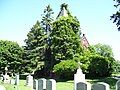 Overgrown cemetery chapel
