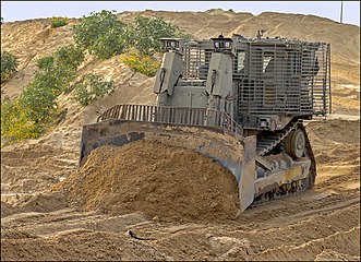 IDF Caterpillar D9 uses a standard blade or a special mine plow.