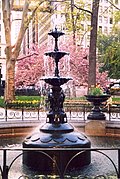 The fountain, a modern reproduction installed in 1990 based on the 1867 original, restored in 2015[27][28]