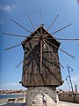 The wooden windmill before the town entrance