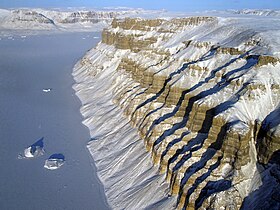 View of deep canyons, or fjords, along the coast of northwestern Greenland