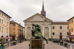 Piazza Sant'Agostino, old town. War memorial and Sant'Agostino church in the background