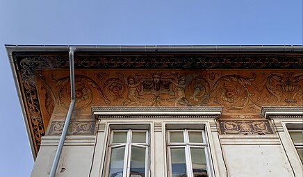 Renaissance Revival grotesque with putti on the Doctor Răuțoiu House (Strada Tache Ionescu no. 29), Bucharest, Romania, designed by Gregoire Marc and Ernest Doneaud, c. 1910[14]