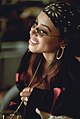 Bandanas, large hoop earrings and wireframe rectangle sunglasses were fashion trends in the early-2000s, as modeled here by R&B artist Aaliyah in 2000