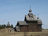 Architectural-ethnographic museum "Khokhlovka" in Perm Krai. Church of Transformation of the Lord (1707) and a watchtower (17th century).