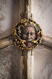 Elaborate foliate head in Norwich Cathedral, Norfolk, England, 14th or early 15th century[6]