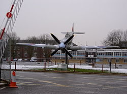 A full-size model Spitfire gate guard at the entrance to RAF Uxbridge.