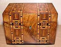 An English tea caddy decorated with wood inlay