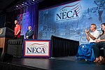 President Donald J. Trump welcomes IBEW 98 apprentice Liam Nicolette to the podium at the National Electrical Contractor Association Tuesday, Oct. 2, 2018, at the Pennsylvania Convention Center in Philadelphia.