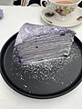A slice of ube crepe cake