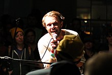 Josiah Johnson, vocalist for The Head and the Heart, singing at a live performance in 2015.