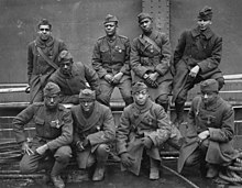 B&W photo of Men in uniform