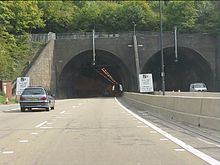 Two two-lane tunnel portals on a motorway