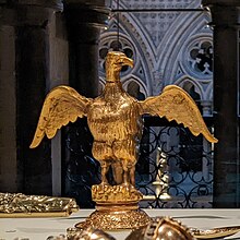 Gold ornament of an eagle with outspread wings
