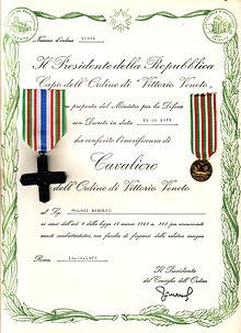 "Number of Order 11996/ The President of the Republic/ Head of the Order of Vittorio Veneto/ on proposal of the Minister of Defence/ with Decree dated 16.06.1973/ has conferred the honour of/ Knight /of the Order of Vittorio Veneto/ on Mr. Arnolfo Mugnai /in accordance with Art. 4 of the Law No. 263 of 18 March 1968 in recognition of/ merit for combat, with right to bear the relative insignia/ Rome, 16.06.1973/ (Signed) the President of the Council of the Order."
