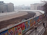 This image was taken in 1986 by Thierry Noir at Bethaniendamm in Berlin-Kreuzberg.