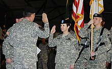 Brigadier General Colleen McGuire takes oath of office in Washington DC in 2010.