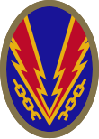 Oval shaped shoulder patch with a deep blue background. Lightning bolts break a yellow chain, representing the liberation of Nazi-occupied Europe.