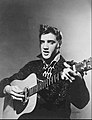 Image 15Elvis Presley in 1956, a leading figure of rock and roll and rockabilly. (from 20th century)