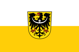 The variant version of the flag of Lower Silesia, used in Saxony, including the coat of arms of Lower Silesia.
