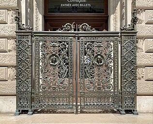 Neoclassical rinceaux on a grille at an entrance of the Salle Favart, Paris, probably designed by Louis Bernier, 1893-1898