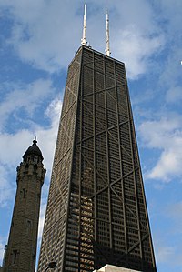 John Hancock Center in Chicago by Fazlur Rahman Khan was the first building to use X-bracing to create the trussed-tube design.