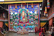 Large appliqué festival thangka hung in the courtyard at Jakar Dzong in Bhutan