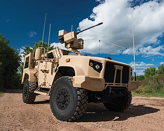 Oshkosh L-ATV in M1278 Heavy Guns Carrier JLTV configuration and fitted with an EOS R-400S-MK2 remote weapon system integrated with Orbital ATK's M230 LF 30 mm lightweight automatic chain gun