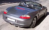 Porsche Boxster circa 2004, with detachable clear plastic windblocker and a Z-fold top[64]