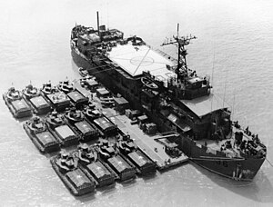 USS Colleton (APB-36) with Armoured Troop Carriers in Vietnam, circa 1968