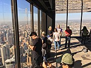 Tourists enjoy views at the southwest corner of the observation deck in 2017