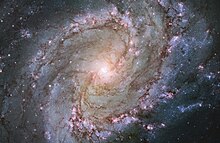 A photograph of the Messier 83 galaxy taken by Hubble telescope.