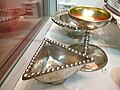 Traprain Law Treasure. Triangular silver dish, drinking cup and bowl.