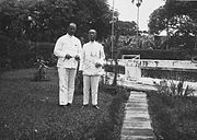 Khouw Kim An, Majoor der Chinezen of Batavia with a European friend (early 20th century).