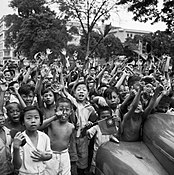 Children of Singapore cheer the arrival of the 5th Indian Division, 5 September 1945.