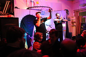 Koo Koo performing in 2012. From left to right: Bryan and Neil