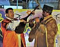 Ashuq plays balaban (right) in Baku. The Lute to the left is a Bağlama.