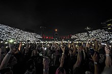 View of the crowd lighting up the stadium with their cell phones during Rammstein's September 23rd 2022 performance at LA Coliseum.