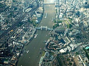 Southwark St Olave covered most of the left of this 2004 photo, taken looking west with St Saviour's Dock above the barges at the bottom and London Bridge at the top