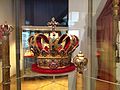 Grand Ducal Crown of Baden, 1811 (Karlsruhe Palace), made of a wire frame reinforced with paperboard, crimson coloured velvet, gold-plated sheet silver, yellow silk taffeta embroidered with gold threads, set with gold-plated sequins, diamonds and rubies.