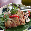 Chin som mok, northern Thai speciality, grilled pork skin fermented with glutinous rice